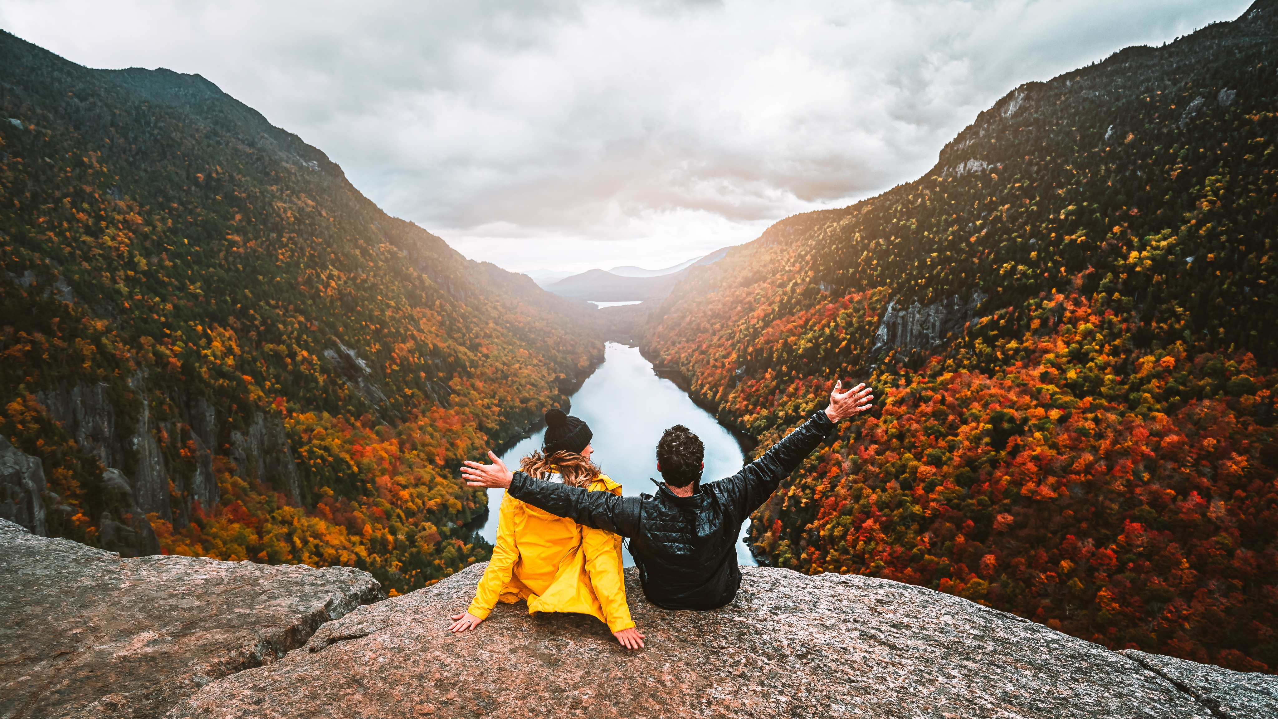 A couple overlooks the immaculate views of Canada's fall colors.