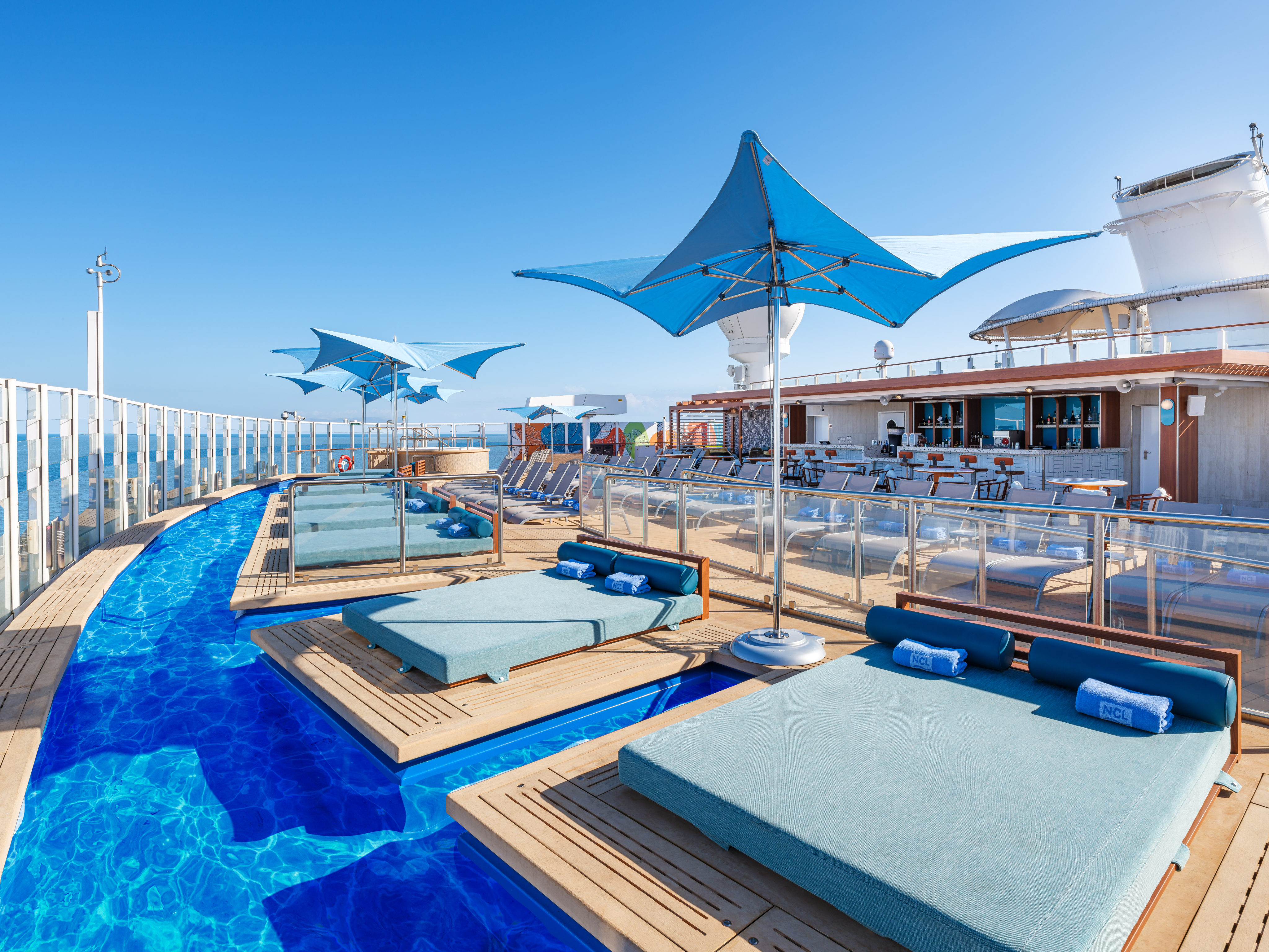 Norwegian cruise ship deck pool with lounge chairs