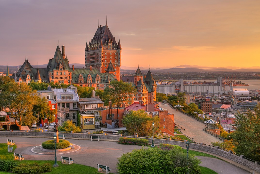 Historic Quebec sees maritime traffic at sunset.